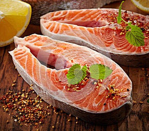 Fresh raw salmon steak slices