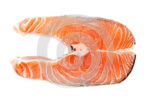 Fresh raw salmon steak slices.