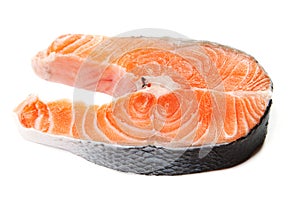 Fresh raw salmon steak slices.