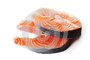 Fresh raw salmon steak slices.