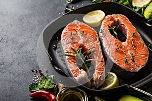 Fresh raw salmon steaks on grill pan  ready for cooking