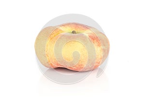 Fresh raw saturn peach isolated on white