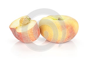 Fresh raw saturn peach isolated on white