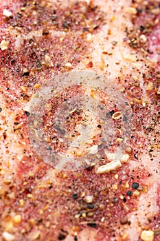 Fresh raw seasoned pork steak meat macro close up shot top view