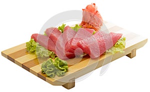 Fresh raw tuna fish pieces on plate isolated