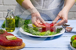 Fresh raw tuna fish was cut into pieces. Cooking Tuna fish