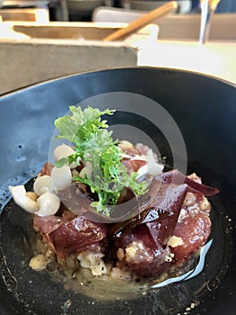 Fresh raw tuna served with miso soup and shimeji mushrooms