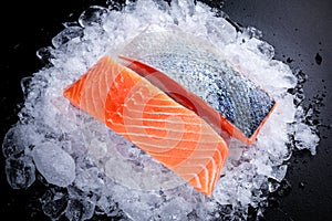 Fresh Raw two salmon fillet on ice