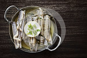 Fresh razor shell seafood steamed in garlic herb wine sauce