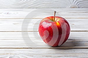 Fresh Red Apple Ã¢â¬' Close-Up on White Wooden Background
