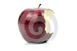 Fresh red apple nibble on white background