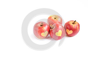 Fresh red apples with heart shape on it isolated on white background, healthy eating, health, holiday concept