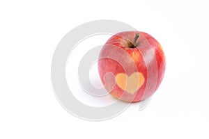 Fresh red apples with heart shape on it isolated on white background, healthy eating, health, holiday concept
