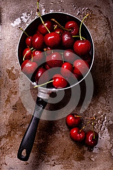 Fresh red cherries in the foreground