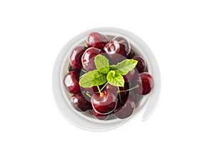 Fresh red cherries isolated on white background. Cherries in a bowl on white. Cherry fruit with copy space for text. Ripe cherry o