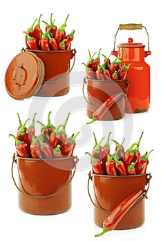 Fresh red chili peppers in an old   enamel cooking pot