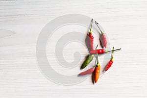 Fresh red Chilli peppers on the table.