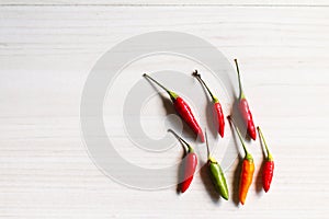 Fresh red Chilli peppers on the table.