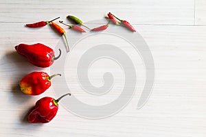 Fresh red Chilli peppers  on the table.