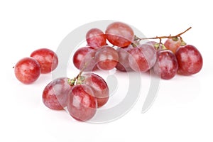 Fresh red grape isolated on white