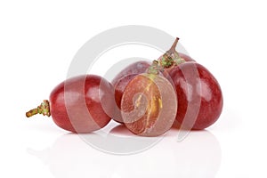 Fresh red grape isolated on white