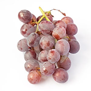 Fresh red grape isolated on white