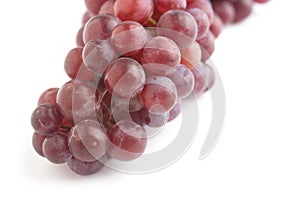 Fresh red grape isolated on white background