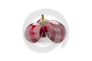 Fresh red grape isolated on white background
