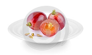 Fresh red grape in plate on white background