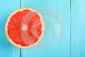 Fresh Red Grapefruit Slice On Table