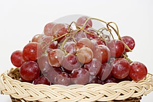 Fresh Red Grapes In White Isolated Background