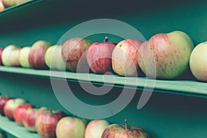 Fresh red and green apple healthy fruit stall in market shelf