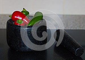 Chili Peppers In Stone Mortar & Pestle Up Close