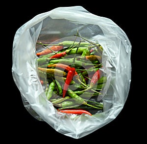 Fresh red green chillies in plastic bags