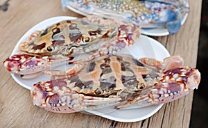 Fresh red horse crab on white plate