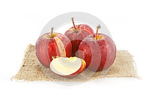 Fresh red juicy apples fruit isolated on white background