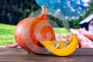 Fresh red kuri pumpkin hokkaido with country nature