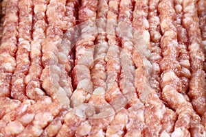 Fresh red pork minced meat texture close up.
