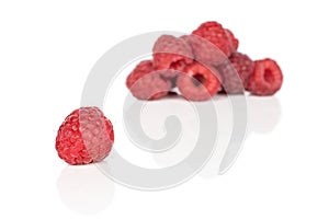 Fresh red raspberry isolated on white