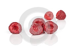 Fresh red raspberry isolated on white