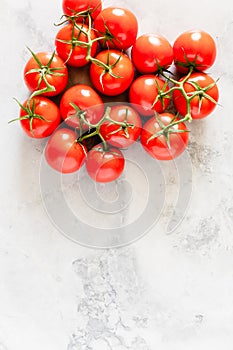 Fresh Red Ripe Tomatoes On The Vine On Marble Background