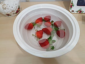 Fresh red strawberries in bowl