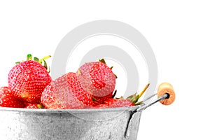 Fresh red strawberry in iron bucket