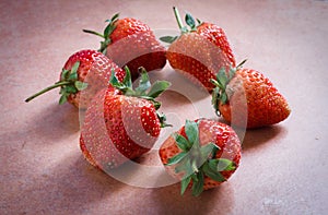 Fresh red strawberry on table