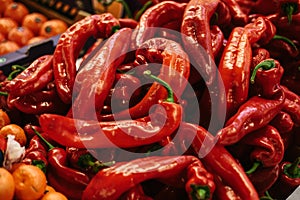 Fresh red sweet paprika on the farmers market. Dietary and vegetarian product.