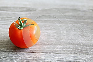 Fresh red tomatoes on a board