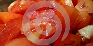 Fresh red tomatoes slices isolated