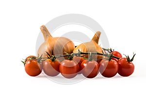Fresh red tomatos and onions isolated on white