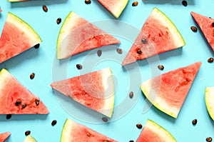 Fresh red watermelon slice Isolated light blue background.  Summer concept.Top view, Flat lay.