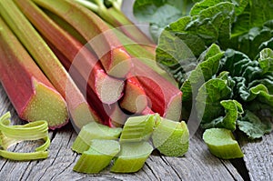 Fresh rhubarb on wooden background